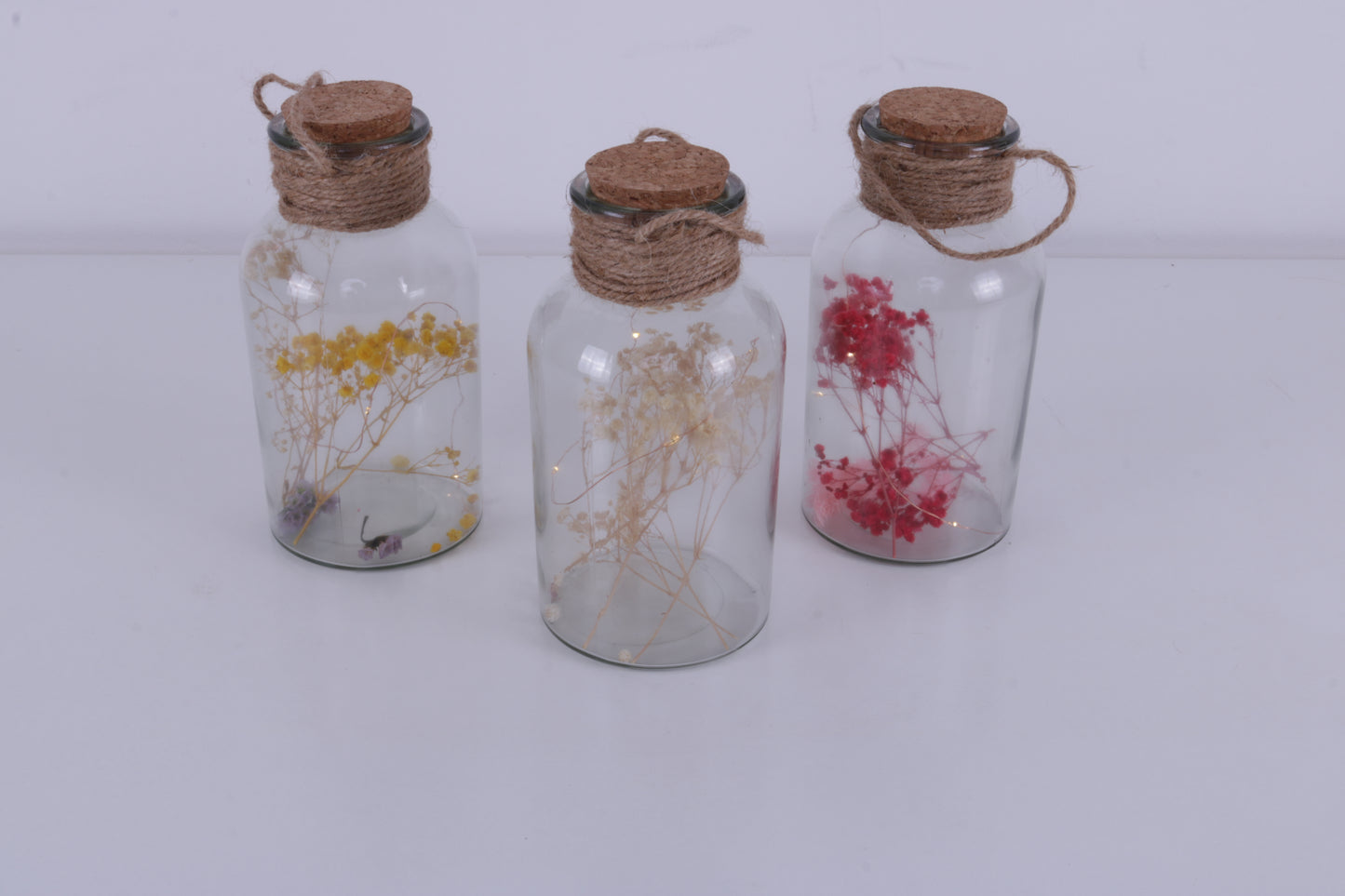 Beleuchtetes Dekoglas mit Trockenblumen MIETEN