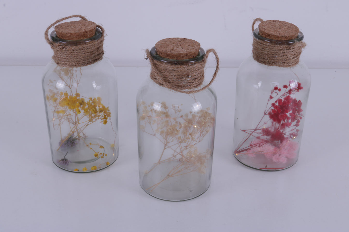 Beleuchtetes Dekoglas mit Trockenblumen MIETEN